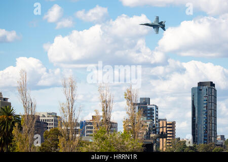 MELBOURNE, AUSTRALIA - MARCH 14: An Royal Australian Air Force FA18A Hornet performs in a public display above Melbourne on March 14, 2015 Stock Photo