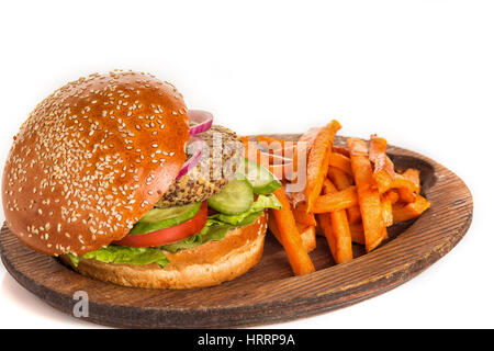 Vegetarian burger with vegetables in a wooden plate on a white background Stock Photo