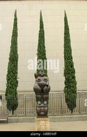 Woman standing on a Man's head bronze sculpture, Plaza Botero Stock Photo