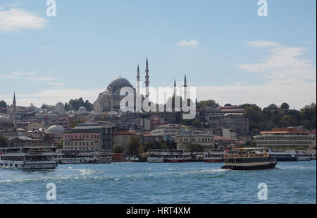 FERRY CROSSING THE BOSPHORUS ISTANBUL WITH VIEW OF SULEYMANIYE MOSQUE TURKEY Stock Photo