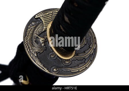 Tsuba : hand guard of Japanese sword with white background Stock Photo