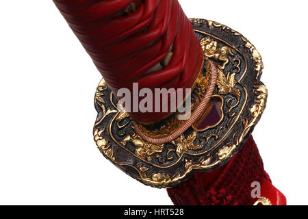 Tsuba : hand guard of Japanese sword with white background Stock Photo