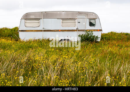 An old caravan on the peat beds at Cuidhsiadar on the Isle of Lewis in the Outer Hebrides. Stock Photo