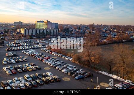 Cars are parked in a lot near Newark Liberty International Airport, Newark, New Jersey, December 21, 2016. Stock Photo