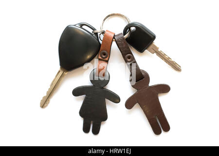 Car key and leather keychain on white background. Stock Photo