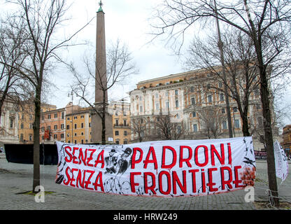 Sit-in in Rome in solidarity with immigrant laborers of the Foggia countryside who lived in the 'large ghetto', located between San Severo Rignano Garganico (Foggia). Two African immigrants of 33 and 36 years died charred as a result of a fire that has developed last night that destroyed several huts. The 'large ghetto', which housed hundreds of immigrant laborers, had been vacated on March 1, but many workers had refused to leave the barracks for fear of losing their jobs. (Photo by Patrizia Cortellessa/Pacific Press) Stock Photo