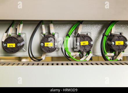 Electrical switches and wires on control panel Stock Photo