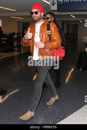 Kings of Leon brothers Caleb Followill and Jared Followill arrive at Los Angeles International (LAX) Airport  Featuring: Caleb Followill Where: Los Angeles, California, United States When: 31 Jan 2017 Stock Photo