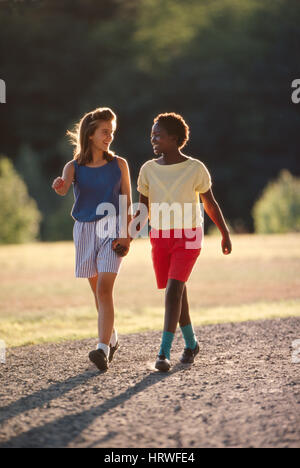 Mindy and Digna walking in Andover, NH USA Stock Photo