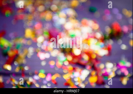 concept of holiday. background is out of focus. colored confetti Stock Photo