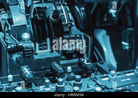 Engine lever in the cockpit of an airliner Stock Photo