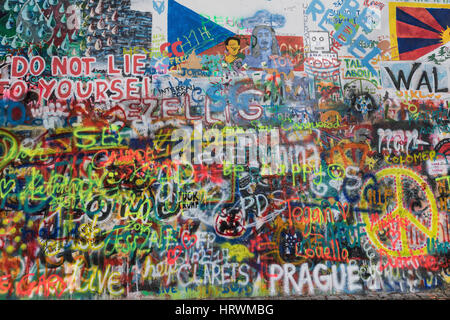PRAGUE, CZECH REPUBLIC - March 02, 2017: The Wall Lennon. John Lennon inspirované graffiti a kousky textu z písní Beatles in Prague Old Town. Stock Photo