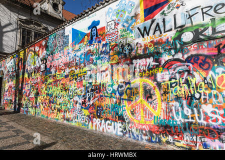 PRAGUE, CZECH REPUBLIC - March 02, 2017: The Wall Lennon. John Lennon inspirované graffiti a kousky textu z písní Beatles in Prague Old Town. Stock Photo