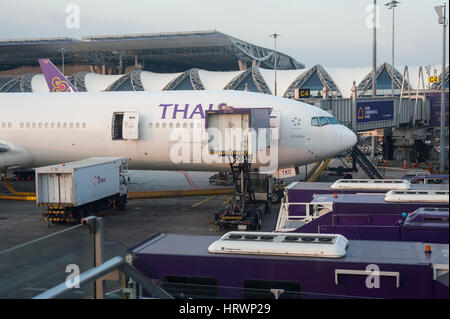 25.01.2017, Bangkok, Thailand, Asia - A Thai Airways passenger plane is parked at a gate at Bangkok's Suvarnabhumi Airport.