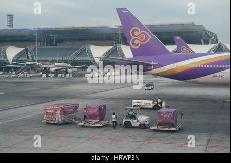 25.01.2017, Bangkok, Thailand, Asia - Thai Airways passenger planes are parked at a gate at Bangkok's Suvarnabhumi Airport.