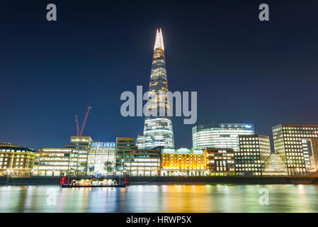 LONDON, UNITED KINGDOM - NOVEMBER 01: This is a view of the Shard buildings in London's financial district with the river Thames at night on November  Stock Photo