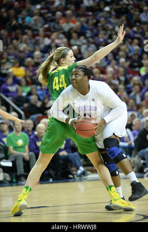 March 3, 2017: UW center Chantel Osahor (0) spins around Oregon defender Mallory McGwire (44) during a PAC12 women's tournament game between the Washington Huskies and the Oregon Ducks. The game was played at Key Arena in Seattle, WA. Jeff Halstead / CSM Stock Photo