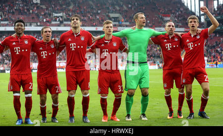 Cologne, Germany. 04th Mar, 2017. Munich's David Alaba (l-r), Philipp Lahm, Javi Martinez, Joshua Kimmich, Manuel Neuer, Franck Ribery and Thomas Mueller celebrating the 3:0 win in the German Bundesliga soccer match between 1. FC Colonge and Bayern Munich in the RheinEnergieStadion in Cologne, Germany, 04 March 2017. (EMBARGO CONDITIONS - ATTENTION: Due to the accreditation guidlines, the DFL only permits the publication and utilisation of up to 15 pictures per match on the internet and in online media during the match.) Photo: Roland Weihrauch/dpa/Alamy Live News