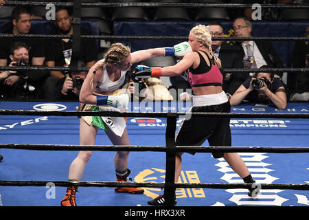 Brooklyn, New York, USA. 4th Mar, 2017. HEATHER HARDY (white, green, and orange trunks) and EDINA KISS battle in bout at the Barclays Center in Brooklyn, New York. Credit: Joel Plummer/ZUMA Wire/Alamy Live News Stock Photo