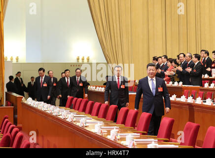 Beijing, China. 5th Mar, 2017. Top Communist Party of China and state leaders Xi Jinping, Li Keqiang, Zhang Dejiang, Yu Zhengsheng, Liu Yunshan, Wang Qishan and Zhang Gaoli attend the opening meeting of the fifth session of the 12th National People's Congress at the Great Hall of the People in Beijing, capital of China, March 5, 2017. Credit: Ma Zhancheng/Xinhua/Alamy Live News Stock Photo