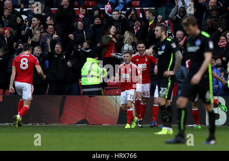 Nottingham Forest's Ben Osborn (centre) celebrates scoring his side's second goal of the game during the Sky Bet Championship match at the City Ground, Nottingham. PRESS ASSOCIATION Photo. Picture date: Saturday March 4, 2017. See PA story SOCCER Forest. Photo credit should read: Simon Cooper/PA Wire. RESTRICTIONS: EDITORIAL USE ONLY No use with unauthorised audio, video, data, fixture lists, club/league logos or 'live' services. Online in-match use limited to 75 images, no video emulation. No use in betting, games or single club/league/player publications. Stock Photo