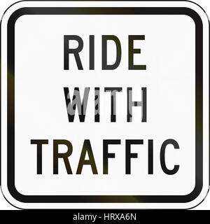 United States MUTCD regulatory road sign - Ride with traffic. Stock Photo