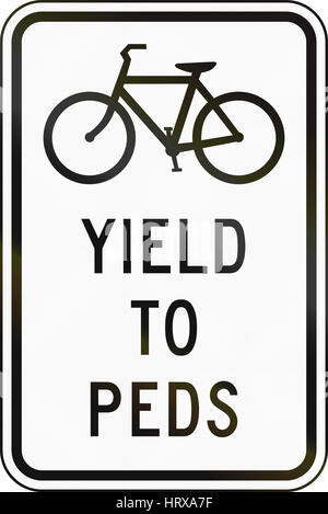 United States MUTCD regulatory road sign - Yield to pedestrians. Stock Photo