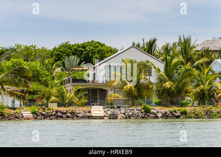 Tamarin, Mauritius - December 8, 2016: Riverside villa where the ocean meets the river, Tamarin, Black River District, Mauritius Stock Photo