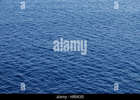 Vast blue ocean background with moderate waves Stock Photo