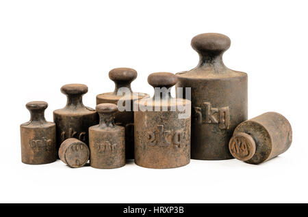 Old and rusty weights on white background Stock Photo