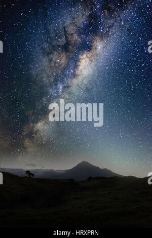 Milky Way over mount Taranaki Stock Photo