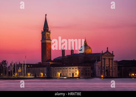 Dawn breaks over the island of San Giorgio Maggiore seen from St. Mark's Square in Venice, Italy Stock Photo