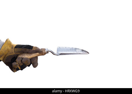 Holding a garden trowel against a white background. Stock Photo