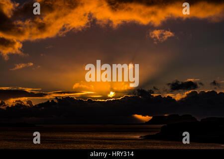Sunset with crepuscular light across Loch Beag, Isle of Skye, looking out to Ullinish Point, Bracdale Point, Ardtreck Point and Isle Oronsay
