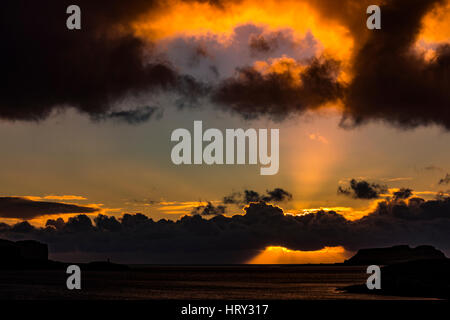 Sunset with crepuscular light across Loch Beag, Isle of Skye, looking out to Ullinish Point, Bracdale Point, Ardtreck Point and Isle Oronsay