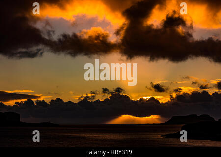 Sunset with crepuscular light across Loch Beag, Isle of Skye, looking out to Ullinish Point, Bracdale Point, Ardtreck Point and Isle Oronsay