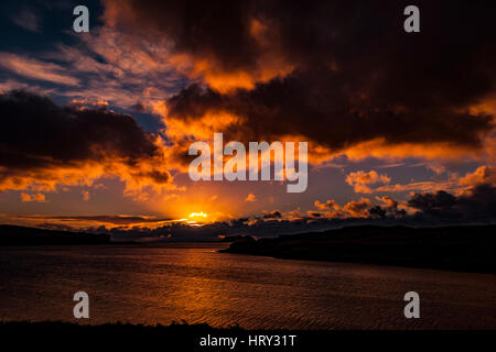 Sunset with crepuscular light across Loch Beag, Isle of Skye, looking out to Ullinish Point, Bracdale Point, Ardtreck Point and Isle Oronsay