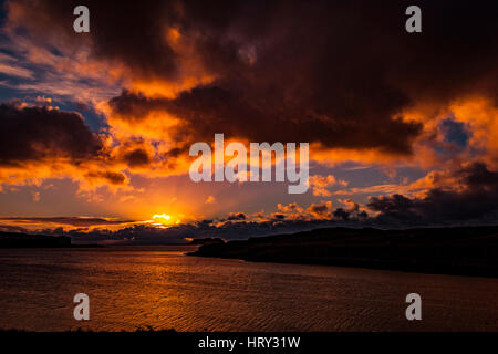 Sunset with crepuscular light across Loch Beag, Isle of Skye, looking out to Ullinish Point, Bracdale Point, Ardtreck Point and Isle Oronsay