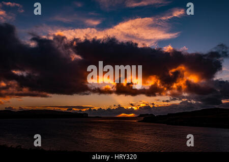Sunset with crepuscular light across Loch Beag, Isle of Skye, looking out to Ullinish Point, Bracdale Point, Ardtreck Point and Isle Oronsay