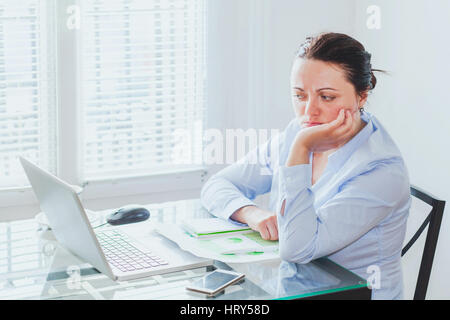 doubt concept, difficult job, business woman in front of complex project with big responsibility, scared uncertain employee in the office Stock Photo