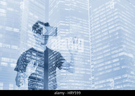 virtual reality concept, double exposure of man in VR headset glasses Stock Photo