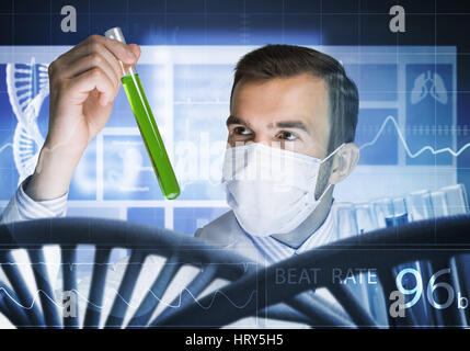 Handsome scientist making research over dna molecule structure Stock Photo