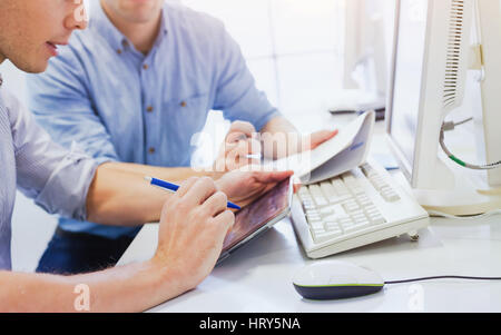 business people working in the office, hands with digital tablet Stock Photo