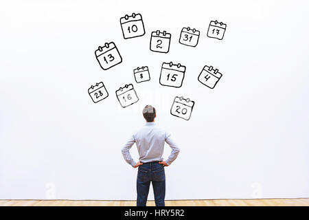 agenda concept, businessman looking at the calendar of events and meetings Stock Photo