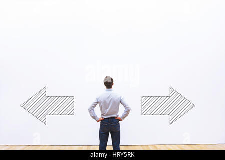decision making, choice or doubt concept, businessman thinking and choosing direction,  business strategy Stock Photo