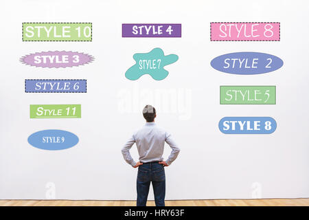 designer choosing style, fonts, shapes and colors  for design Stock Photo