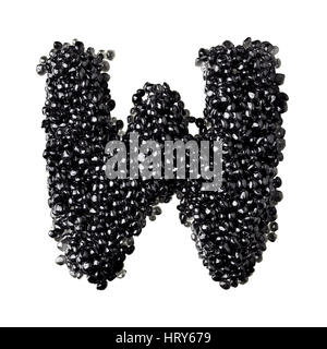 W - Alphabet made from black caviar Stock Photo