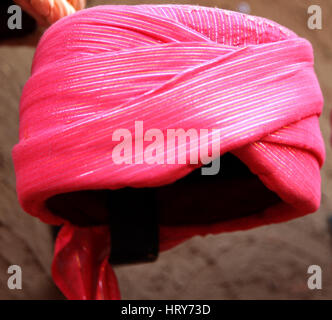 Brightly coloured turban (Rajasthani Traditional Cap), Rajasthan, India (Photo Copyright © by Saji Maramon) Stock Photo