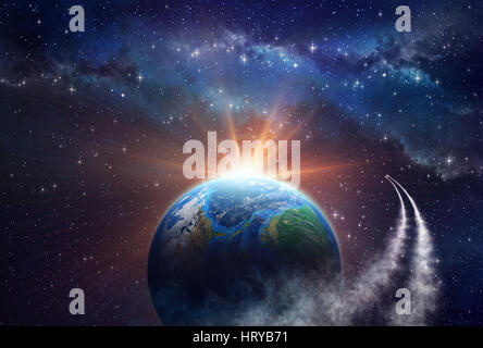 A spaceship entering in the orbit of a planet, with a sunny light shining behind Stock Photo