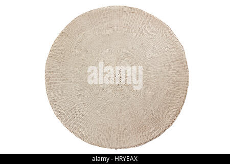 Round wicker placemat on white Stock Photo